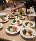 Chef Ginoux plating croquettes.